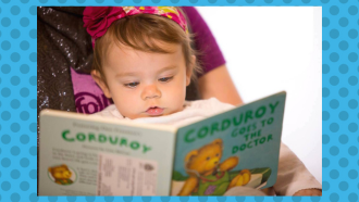 Baby reading a Dolly Parton's Imagination Library book